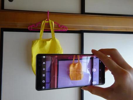 出品作業 撮影,フリマ,フリーマーケットの写真素材
